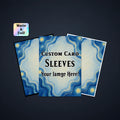 Three custom card sleeves with a blue and cream marbled swirl pattern, displayed on a dark background. The center sleeve features the text 'CUSTOM CARD SLEEVES Your Image Here!'.